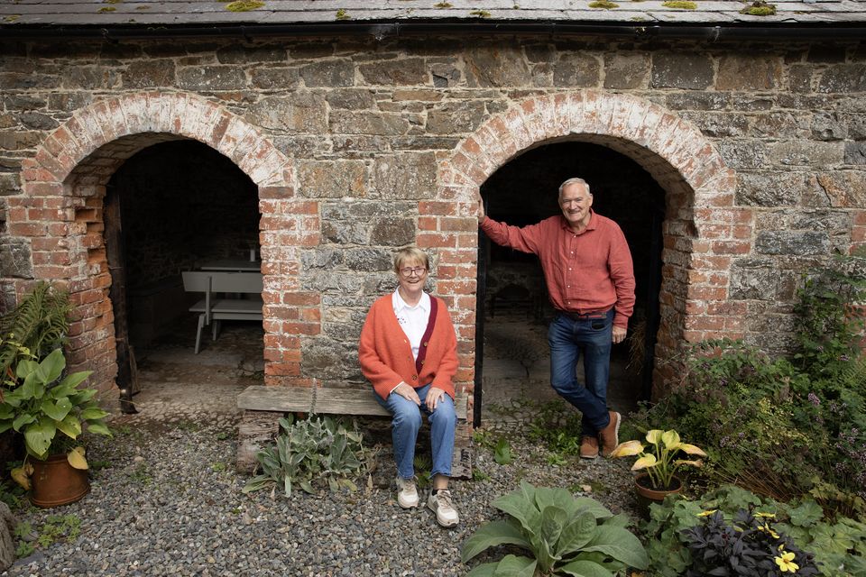Cliona Dooge and Conor Sparks outside the converted cow byre. Photo: Barbara McCarthy